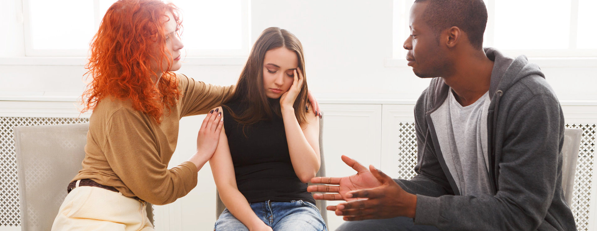 professional performing therapy to a young lady